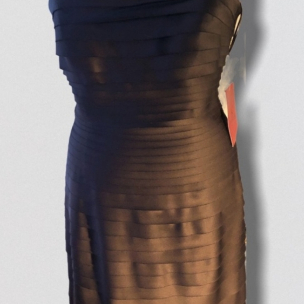 Beautiful spaghetti strap pleated dress with shawl.